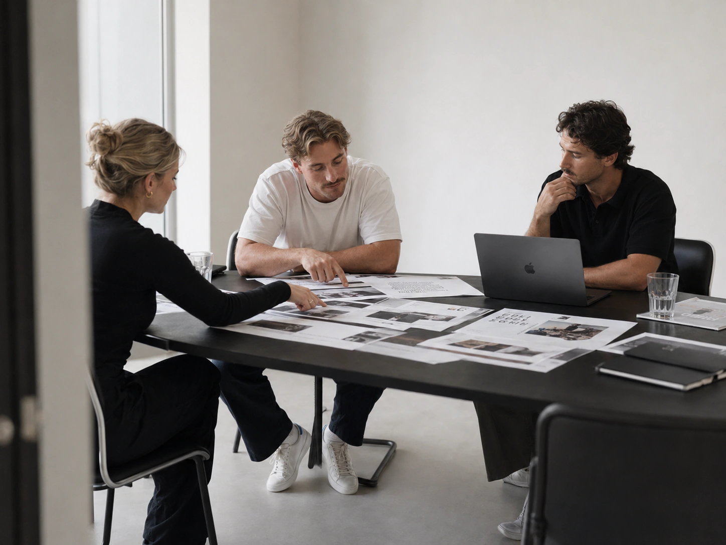 A founder-led senior team reviewing a campaign system